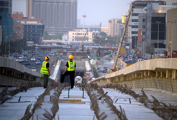 Construction workers on the Dubai Metro tracks