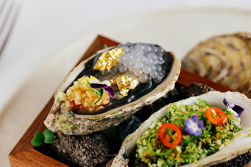 Punjabi grilled oysters with gold