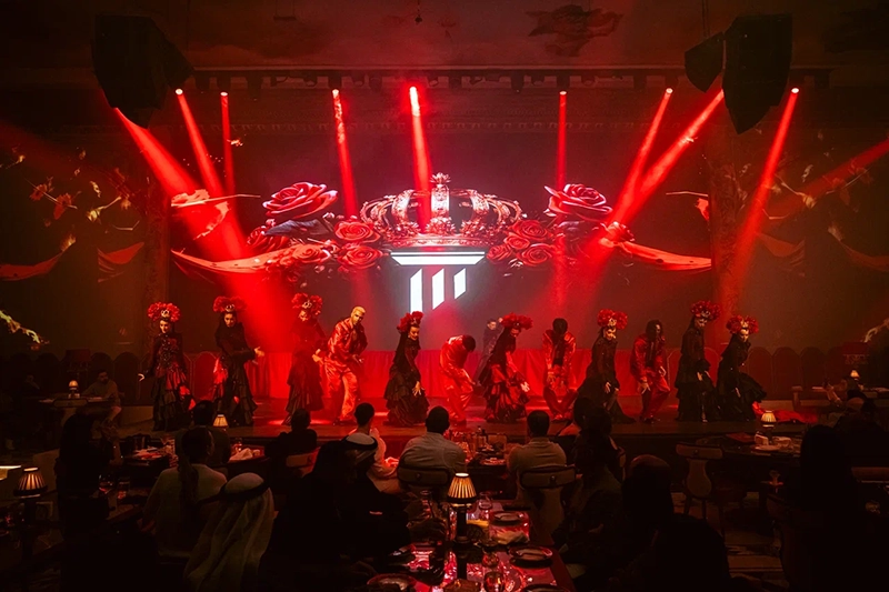 show with dancers and red lights