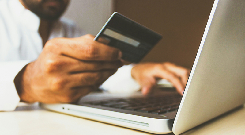 dubai ticket scam credit card laptop
